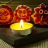 Lord Jagannath pebble art candle stand 2